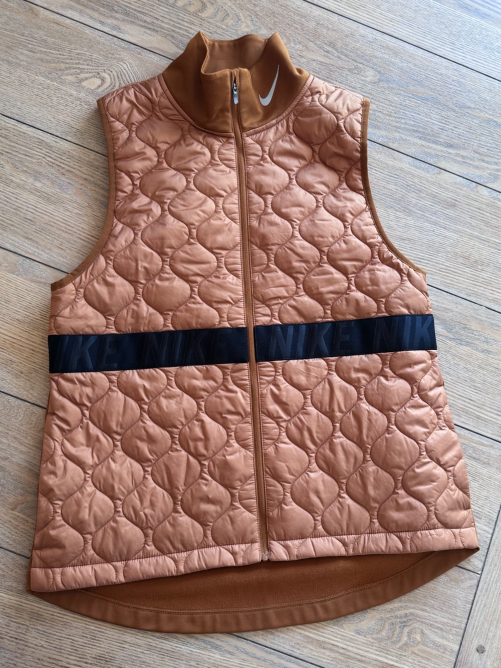 Nike Women’s Quilted Copper-Orange Vest with Black Band